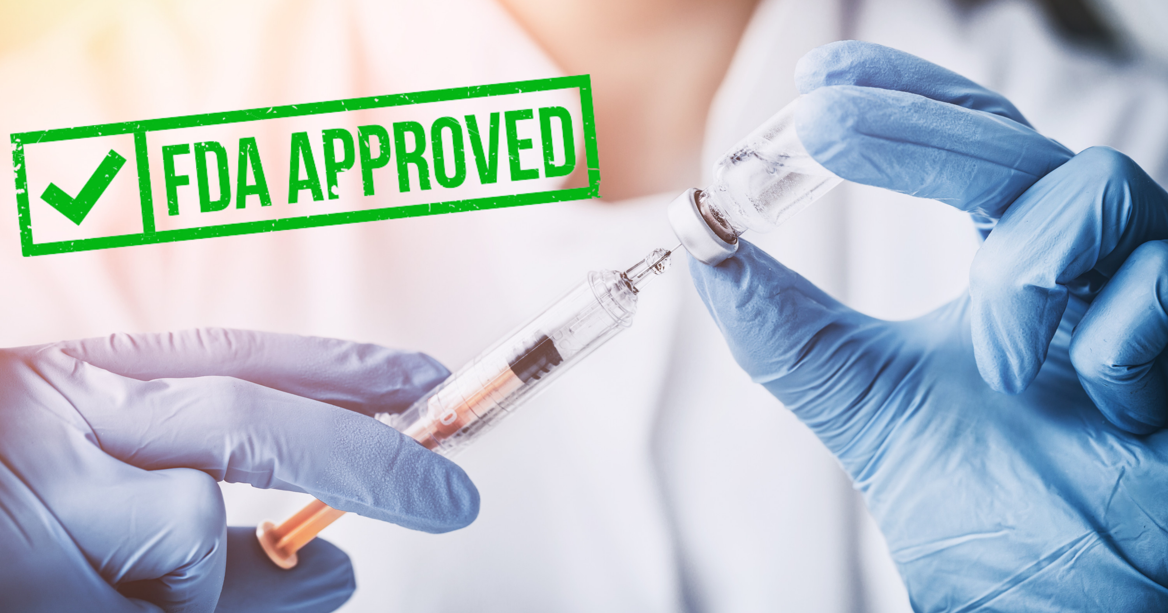 doctor filling syringe with FDA approved written over the image