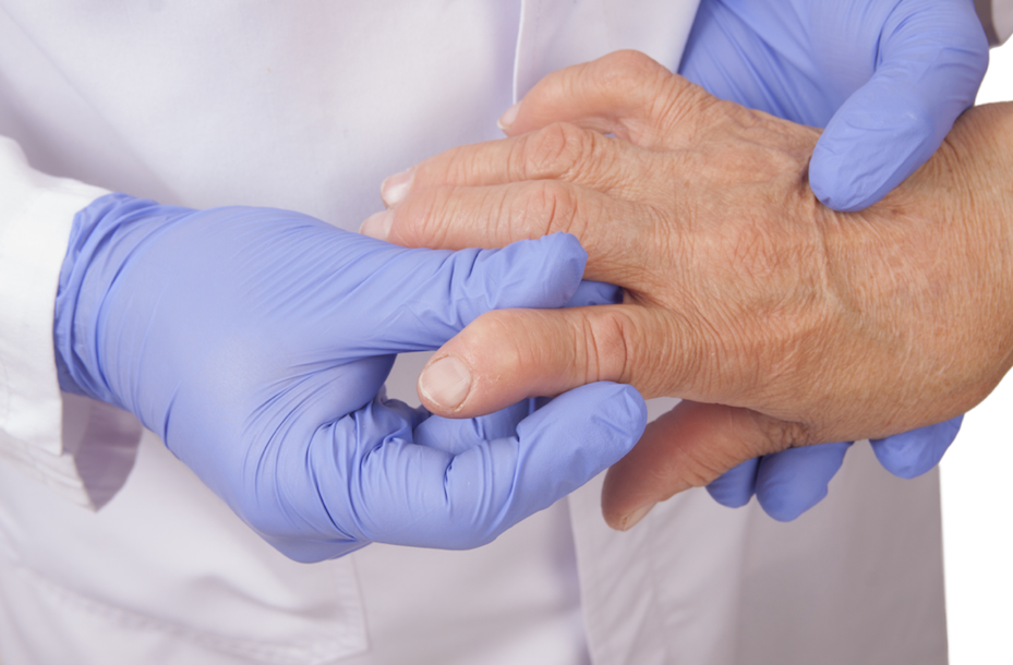 a doctor is holding a patient's hand