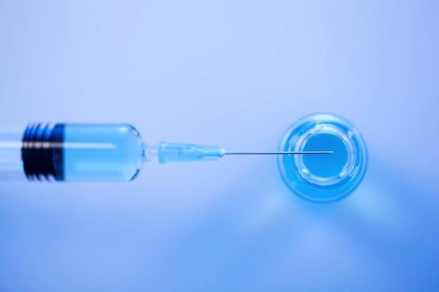 Image of a syringe being filled
