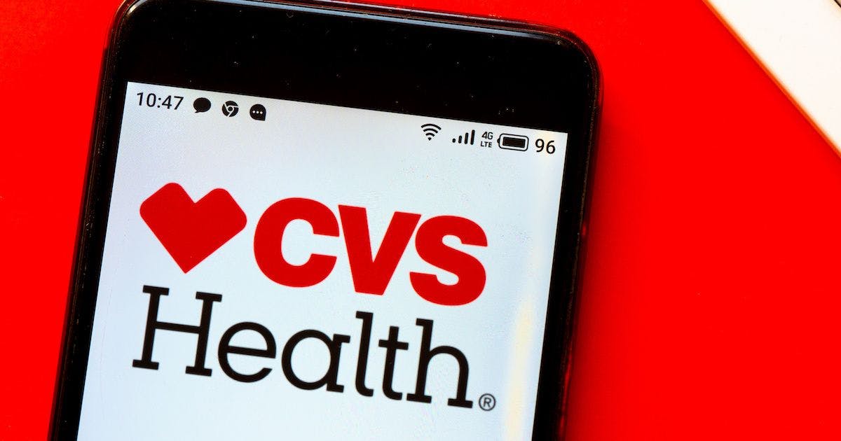 CVS health logo on a phone | Image credit: Игорь Головнёв - stock.adobe.com.