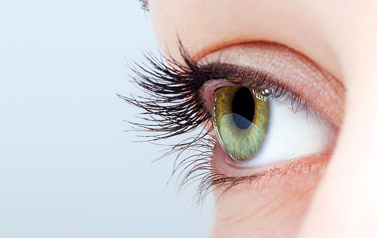 woman's eye, green iris