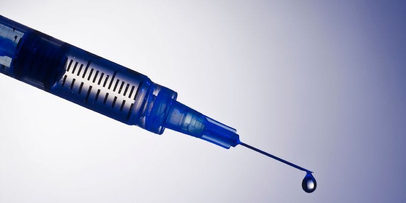 syringe with droplet